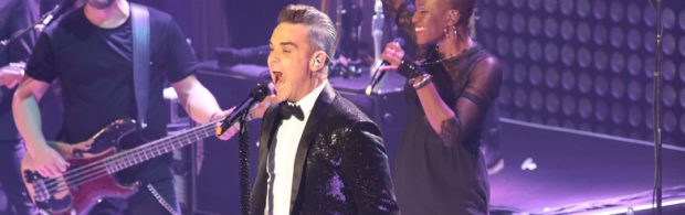 Ik praatte met overleden mensen en heb meerdere UFO's gezien. Robbie Williams doet boekje open